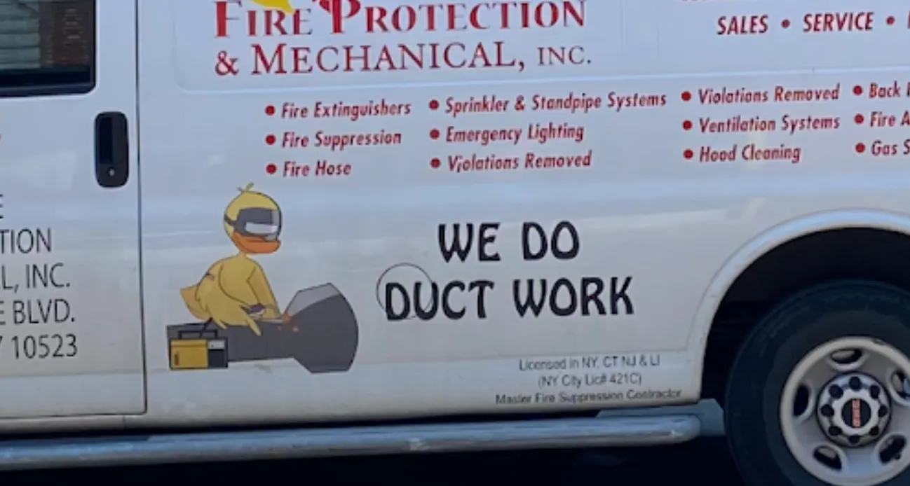 A van with "We Do Duct Work" in the hobo font